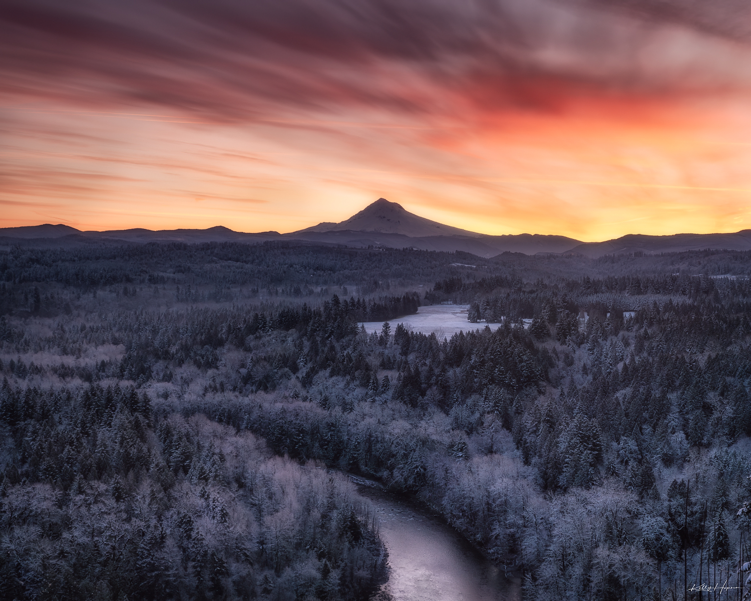MT Hood and the valley below at sunrise.