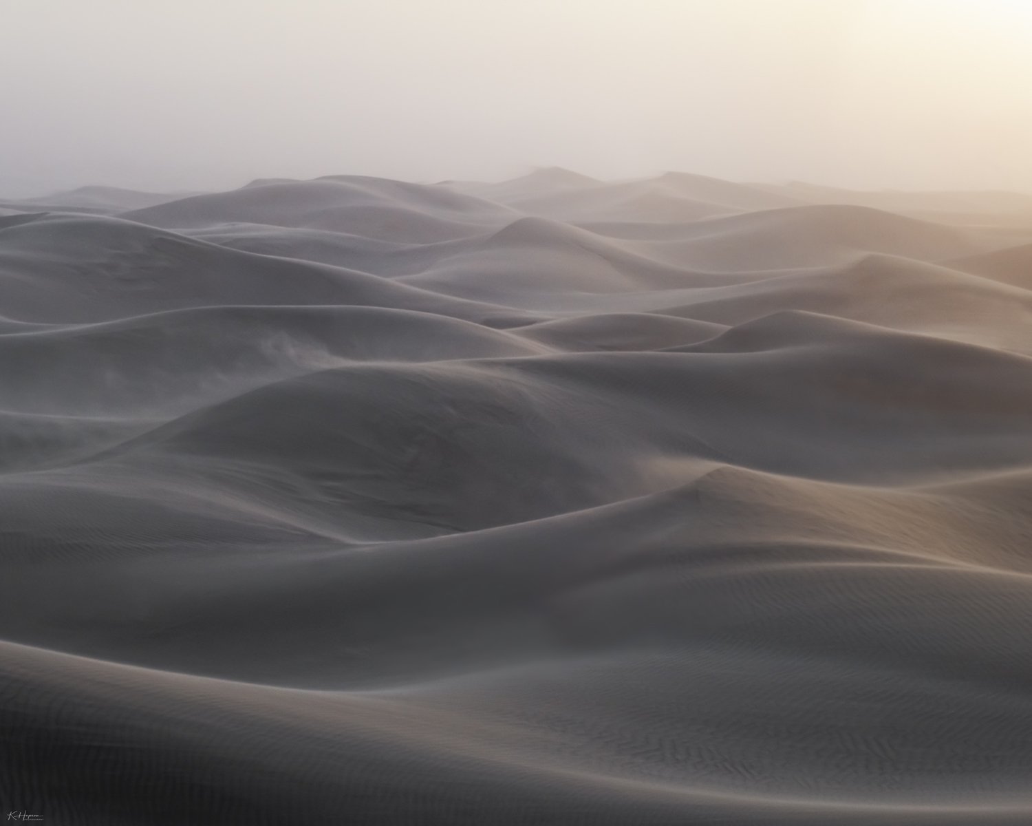 windblown sand and morning sunlight on sand dunes in death valley, california